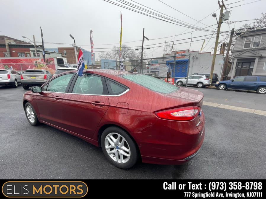 2014 Ford Fusion 4dr Sdn SE FWD, available for sale in Irvington, New Jersey | Elis Motors Corp. Irvington, New Jersey 2014 Ford Fusion 4dr Sdn SE FWD, available for sale in Irvington, New Jersey | Elis Motors Corp. Irvington, New Jersey