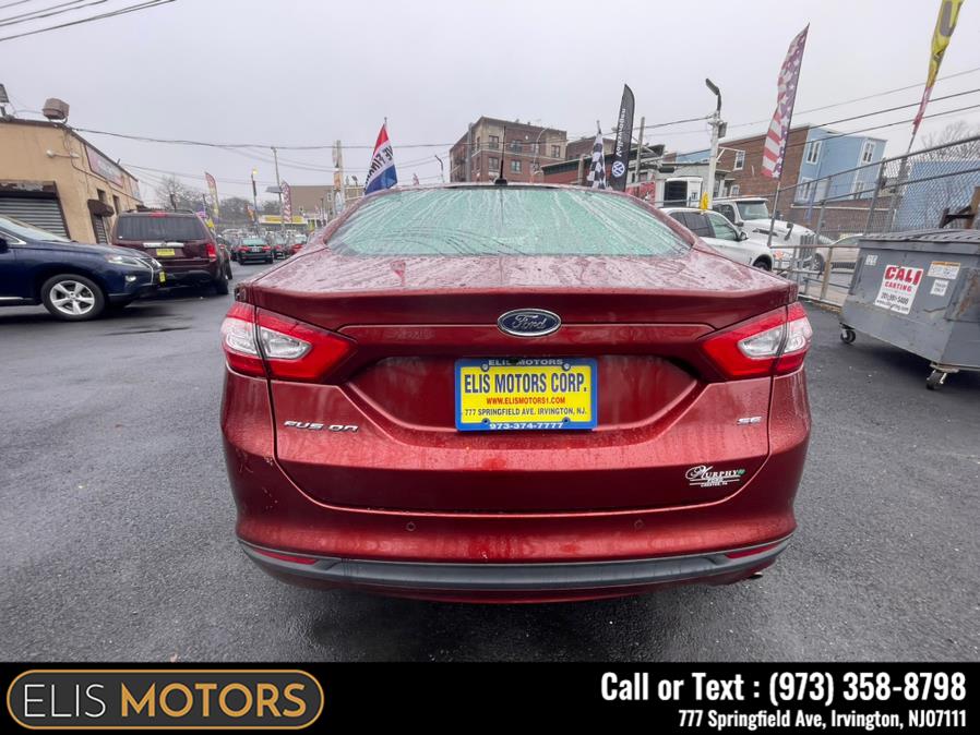 2014 Ford Fusion 4dr Sdn SE FWD, available for sale in Irvington, New Jersey | Elis Motors Corp. Irvington, New Jersey 2014 Ford Fusion 4dr Sdn SE FWD, available for sale in Irvington, New Jersey | Elis Motors Corp. Irvington, New Jersey