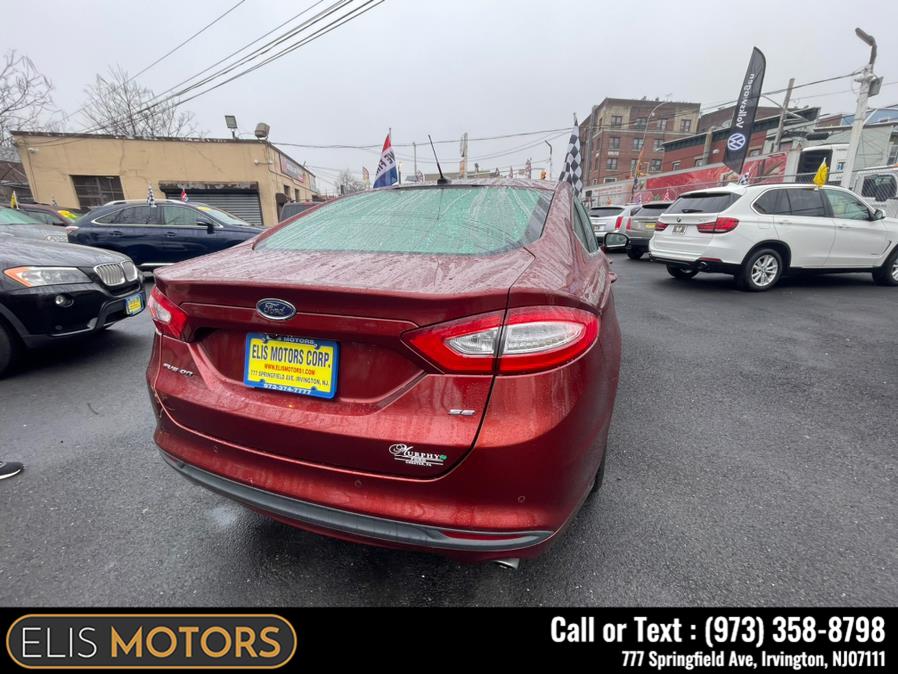 2014 Ford Fusion 4dr Sdn SE FWD, available for sale in Irvington, New Jersey | Elis Motors Corp. Irvington, New Jersey 2014 Ford Fusion 4dr Sdn SE FWD, available for sale in Irvington, New Jersey | Elis Motors Corp. Irvington, New Jersey