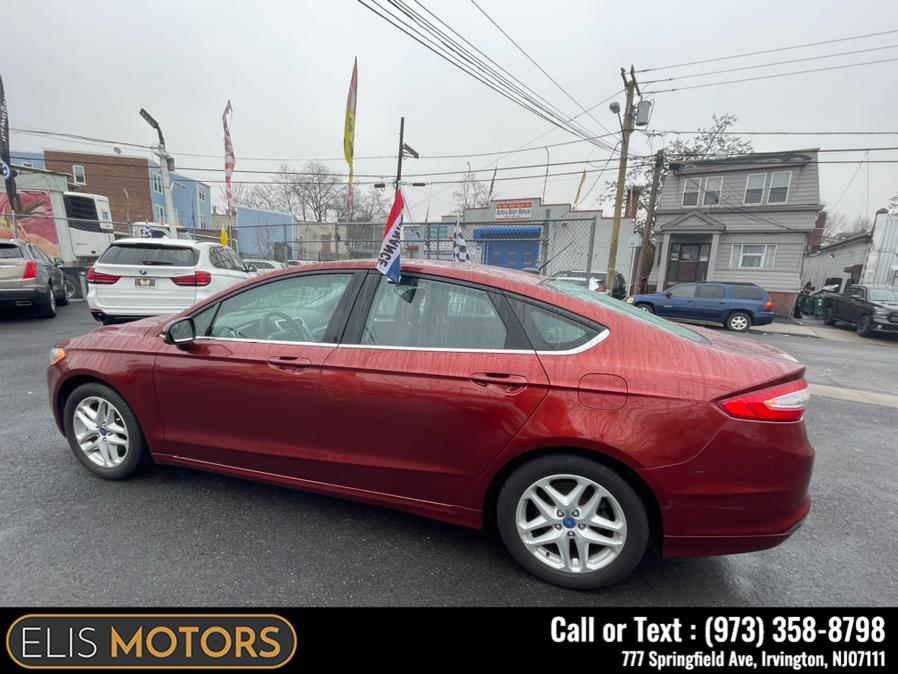 2014 Ford Fusion 4dr Sdn SE FWD, available for sale in Irvington, New Jersey | Elis Motors Corp. Irvington, New Jersey 2014 Ford Fusion 4dr Sdn SE FWD, available for sale in Irvington, New Jersey | Elis Motors Corp. Irvington, New Jersey