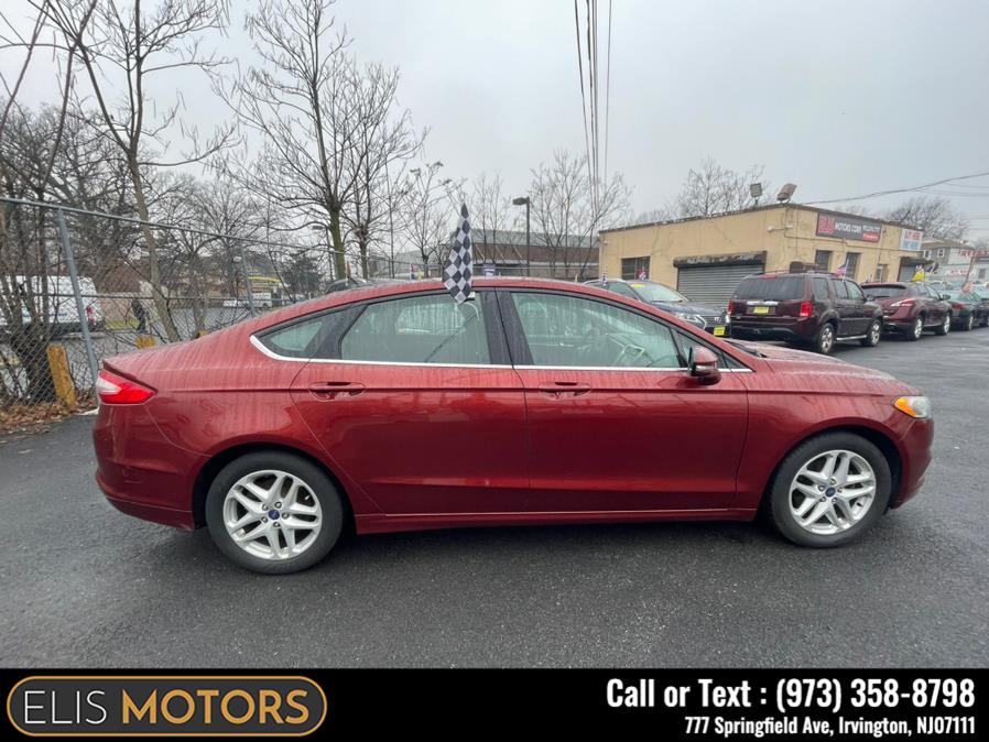 2014 Ford Fusion 4dr Sdn SE FWD, available for sale in Irvington, New Jersey | Elis Motors Corp. Irvington, New Jersey 2014 Ford Fusion 4dr Sdn SE FWD, available for sale in Irvington, New Jersey | Elis Motors Corp. Irvington, New Jersey