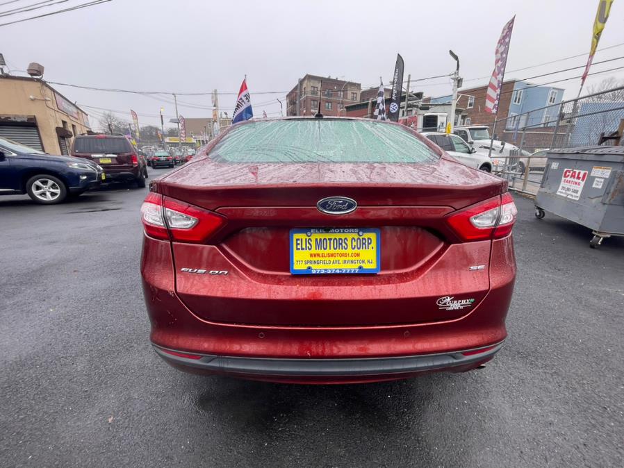 2014 Ford Fusion 4dr Sdn SE FWD, available for sale in Irvington, New Jersey | Elis Motors Corp. Irvington, New Jersey 2014 Ford Fusion 4dr Sdn SE FWD, available for sale in Irvington, New Jersey | Elis Motors Corp. Irvington, New Jersey