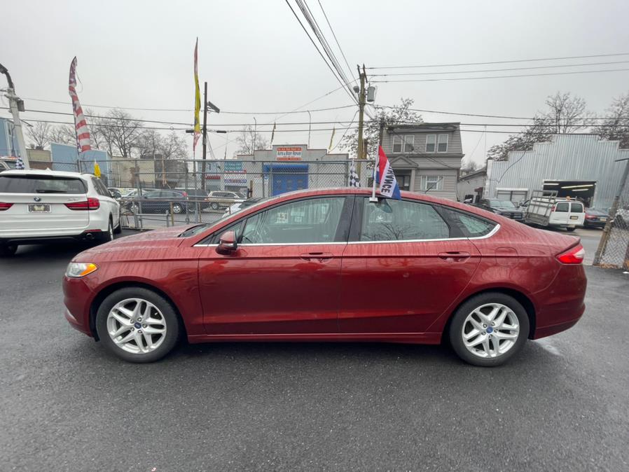 2014 Ford Fusion 4dr Sdn SE FWD, available for sale in Irvington, New Jersey | Elis Motors Corp. Irvington, New Jersey 2014 Ford Fusion 4dr Sdn SE FWD, available for sale in Irvington, New Jersey | Elis Motors Corp. Irvington, New Jersey