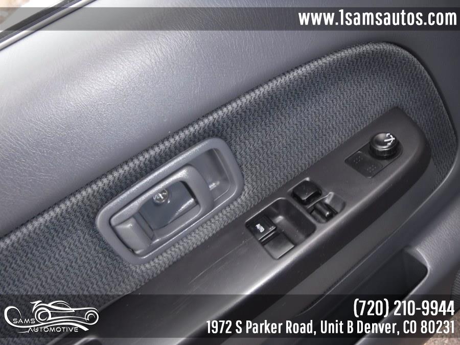 2004 Nissan Frontier 4WD XE King Cab V6 Auto Desert Runner, available for sale in Denver, Colorado | Sam's Automotive. Denver, Colorado 2004 Nissan Frontier 4WD XE King Cab V6 Auto Desert Runner, available for sale in Denver, Colorado | Sam's Automotive. Denver, Colorado