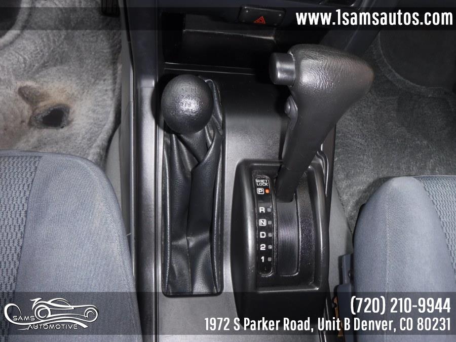 2004 Nissan Frontier 4WD XE King Cab V6 Auto Desert Runner, available for sale in Denver, Colorado | Sam's Automotive. Denver, Colorado 2004 Nissan Frontier 4WD XE King Cab V6 Auto Desert Runner, available for sale in Denver, Colorado | Sam's Automotive. Denver, Colorado