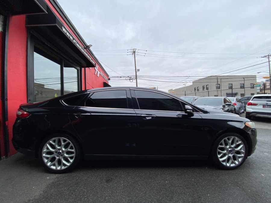 Used Ford Fusion 4dr Sdn Titanium FWD 2014 | RT Auto Center LLC. Newark, New Jersey Used Ford Fusion 4dr Sdn Titanium FWD 2014 | RT Auto Center LLC. Newark, New Jersey