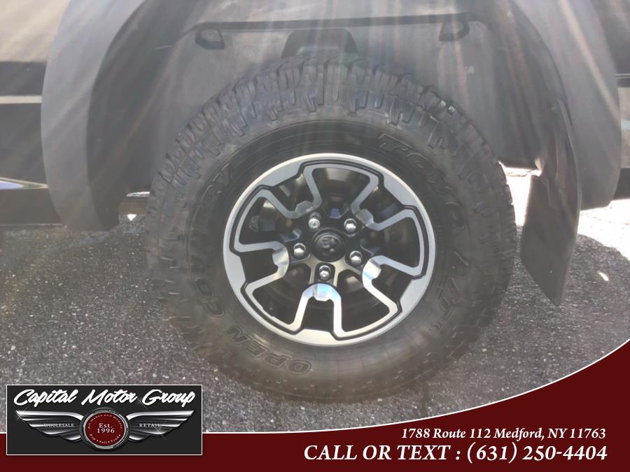 2016 Ram 1500 4WD Crew Cab 140.5" Rebel, available for sale in Medford, New York | Capital Motor Group Inc. Medford, New York 2016 Ram 1500 4WD Crew Cab 140.5" Rebel, available for sale in Medford, New York | Capital Motor Group Inc. Medford, New York
