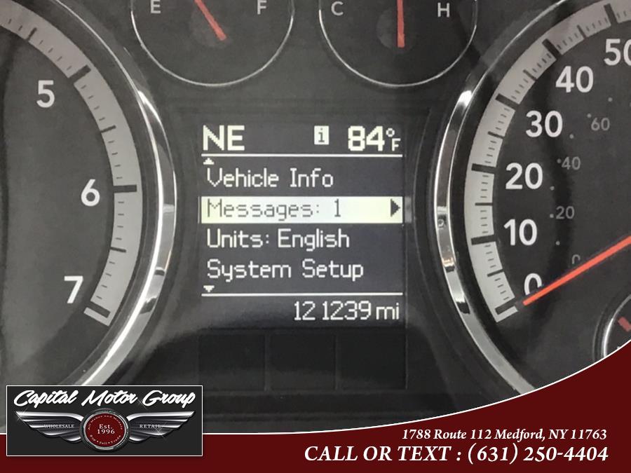 2011 Ram 1500 4WD Crew Cab 140.5" Big Horn, available for sale in Medford, New York | Capital Motor Group Inc. Medford, New York 2011 Ram 1500 4WD Crew Cab 140.5" Big Horn, available for sale in Medford, New York | Capital Motor Group Inc. Medford, New York