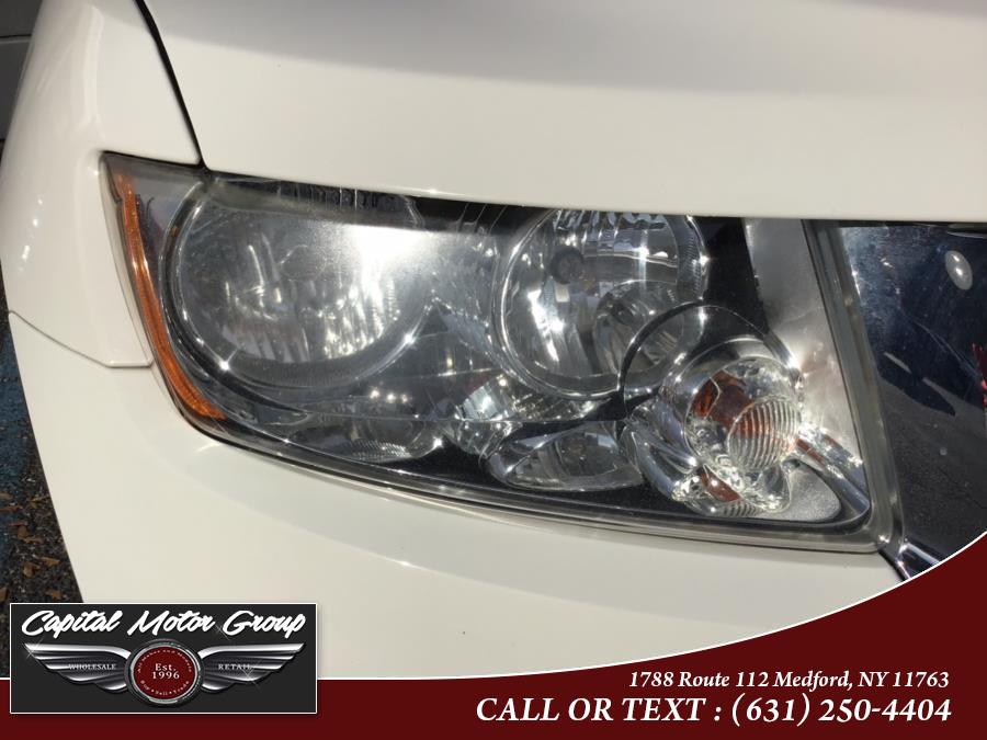 2012 Jeep Grand Cherokee 4WD 4dr Laredo, available for sale in Medford, New York | Capital Motor Group Inc. Medford, New York 2012 Jeep Grand Cherokee 4WD 4dr Laredo, available for sale in Medford, New York | Capital Motor Group Inc. Medford, New York