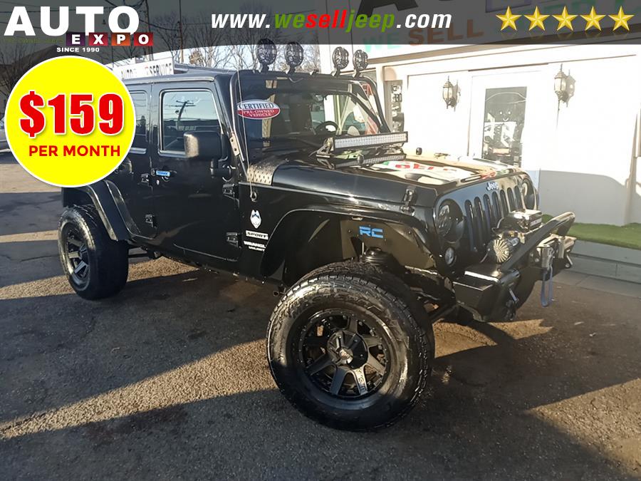 2014 Jeep Wrangler Unlimited 4WD 4dr Sport, available for sale in Huntington, New York | Auto Expo. Huntington, New York