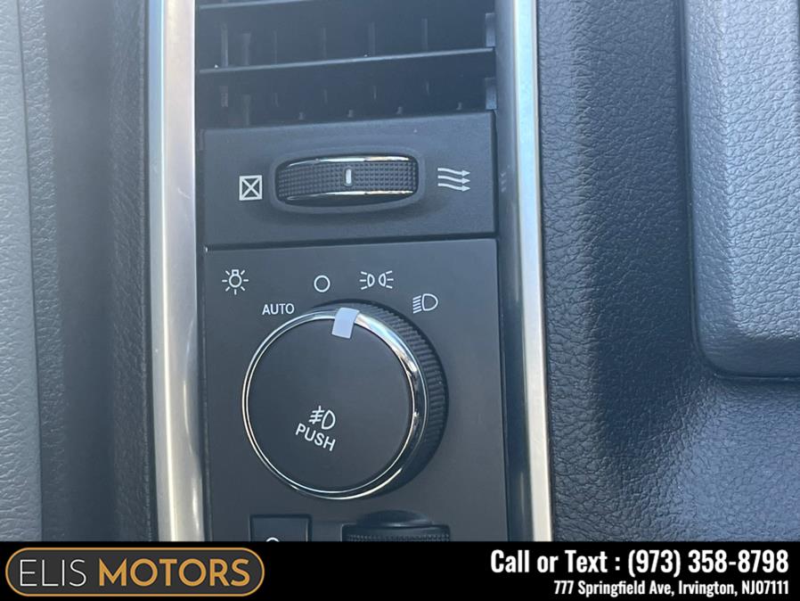 2014 Ram 1500 4WD Quad Cab 140.5" Big Horn, available for sale in Irvington, New Jersey | Elis Motors Corp. Irvington, New Jersey 2014 Ram 1500 4WD Quad Cab 140.5" Big Horn, available for sale in Irvington, New Jersey | Elis Motors Corp. Irvington, New Jersey
