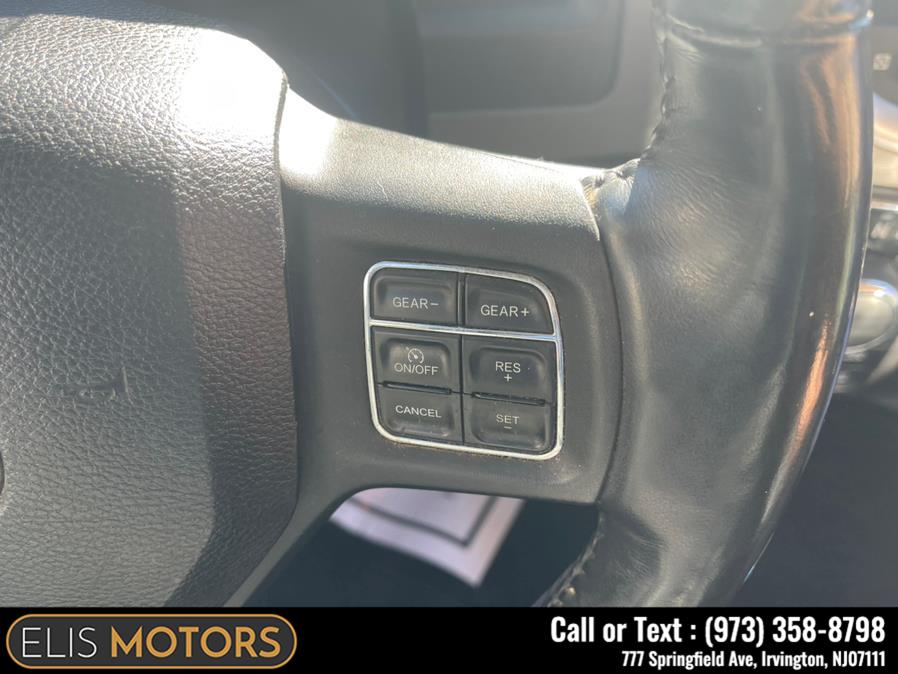2014 Ram 1500 4WD Quad Cab 140.5" Big Horn, available for sale in Irvington, New Jersey | Elis Motors Corp. Irvington, New Jersey 2014 Ram 1500 4WD Quad Cab 140.5" Big Horn, available for sale in Irvington, New Jersey | Elis Motors Corp. Irvington, New Jersey