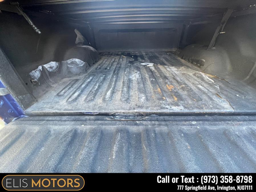 2014 Ram 1500 4WD Quad Cab 140.5" Big Horn, available for sale in Irvington, New Jersey | Elis Motors Corp. Irvington, New Jersey 2014 Ram 1500 4WD Quad Cab 140.5" Big Horn, available for sale in Irvington, New Jersey | Elis Motors Corp. Irvington, New Jersey