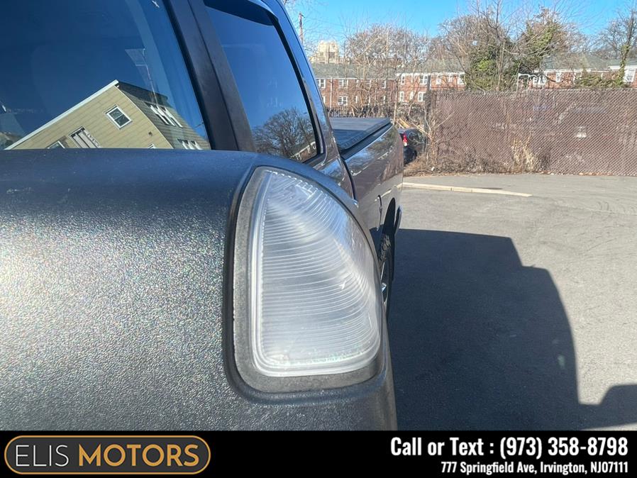 2014 Ram 1500 4WD Quad Cab 140.5" Big Horn, available for sale in Irvington, New Jersey | Elis Motors Corp. Irvington, New Jersey 2014 Ram 1500 4WD Quad Cab 140.5" Big Horn, available for sale in Irvington, New Jersey | Elis Motors Corp. Irvington, New Jersey