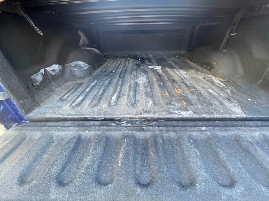 2014 Ram 1500 4WD Quad Cab 140.5" Big Horn, available for sale in Irvington, New Jersey | Elis Motors Corp. Irvington, New Jersey 2014 Ram 1500 4WD Quad Cab 140.5" Big Horn, available for sale in Irvington, New Jersey | Elis Motors Corp. Irvington, New Jersey