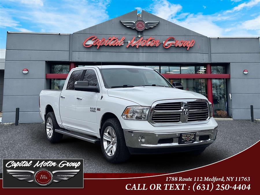 2016 Ram 1500 4WD Crew Cab 140.5" SLT, available for sale in Medford, New York | Capital Motor Group Inc. Medford, New York