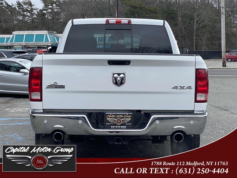 2016 Ram 1500 4WD Crew Cab 140.5" SLT, available for sale in Medford, New York | Capital Motor Group Inc. Medford, New York 2016 Ram 1500 4WD Crew Cab 140.5" SLT, available for sale in Medford, New York | Capital Motor Group Inc. Medford, New York