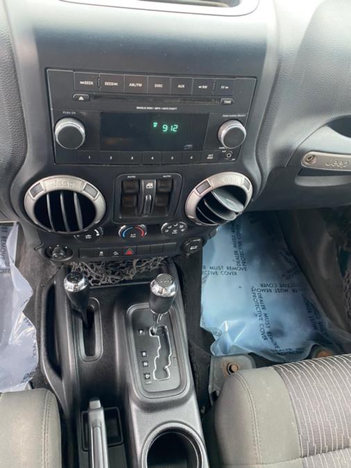 2012 Jeep Wrangler Unlimited 4WD 4dr Sport, available for sale in Canton, Connecticut | Lava Motors 2 Inc. Canton, Connecticut 2012 Jeep Wrangler Unlimited 4WD 4dr Sport, available for sale in Canton, Connecticut | Lava Motors 2 Inc. Canton, Connecticut