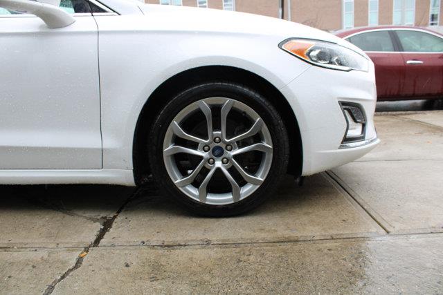 2020 Ford Fusion Hybrid Titanium, available for sale in Elmont, New York | NY Luxury Motors. Elmont, New York 2020 Ford Fusion Hybrid Titanium, available for sale in Elmont, New York | NY Luxury Motors. Elmont, New York
