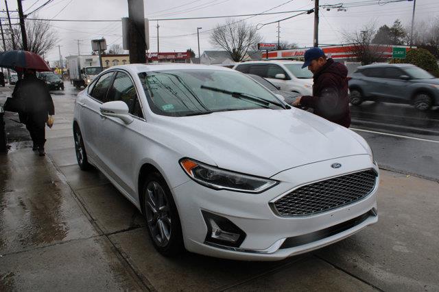 2020 Ford Fusion Hybrid Titanium, available for sale in Elmont, New York | NY Luxury Motors. Elmont, New York 2020 Ford Fusion Hybrid Titanium, available for sale in Elmont, New York | NY Luxury Motors. Elmont, New York
