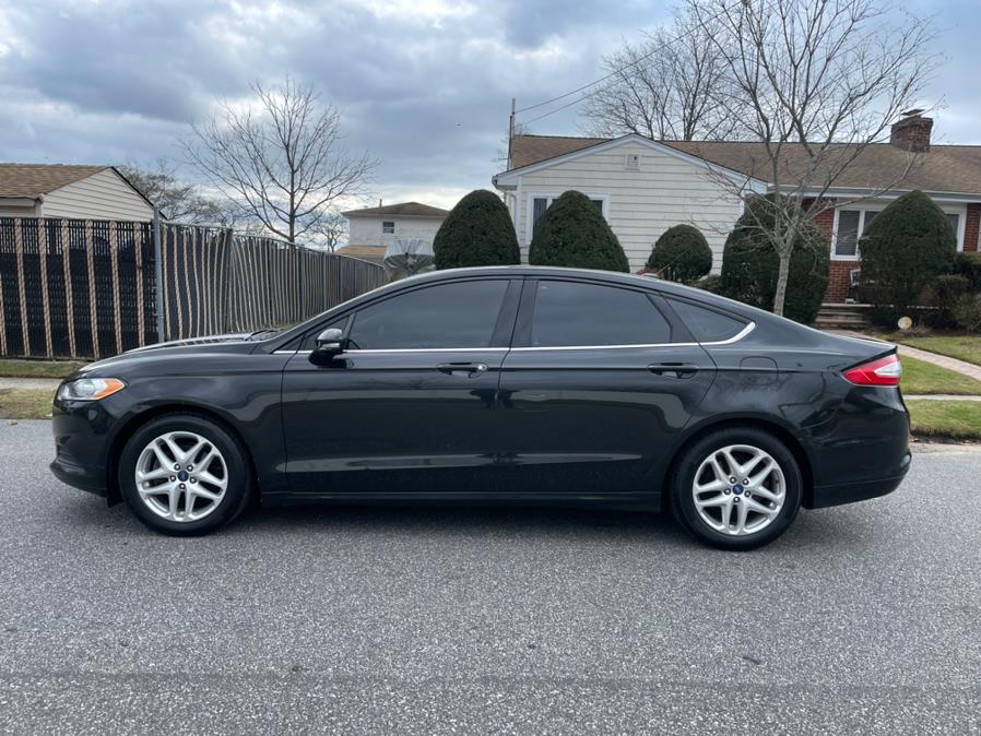 2013 Ford Fusion 4dr Sdn SE FWD, available for sale in Copiague, New York | Great Deal Motors. Copiague, New York