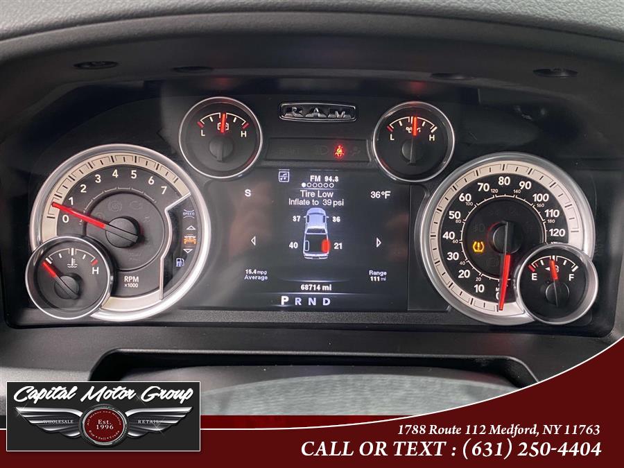 2014 Ram 1500 4WD Quad Cab 140.5" SLT, available for sale in Medford, New York | Capital Motor Group Inc. Medford, New York 2014 Ram 1500 4WD Quad Cab 140.5" SLT, available for sale in Medford, New York | Capital Motor Group Inc. Medford, New York
