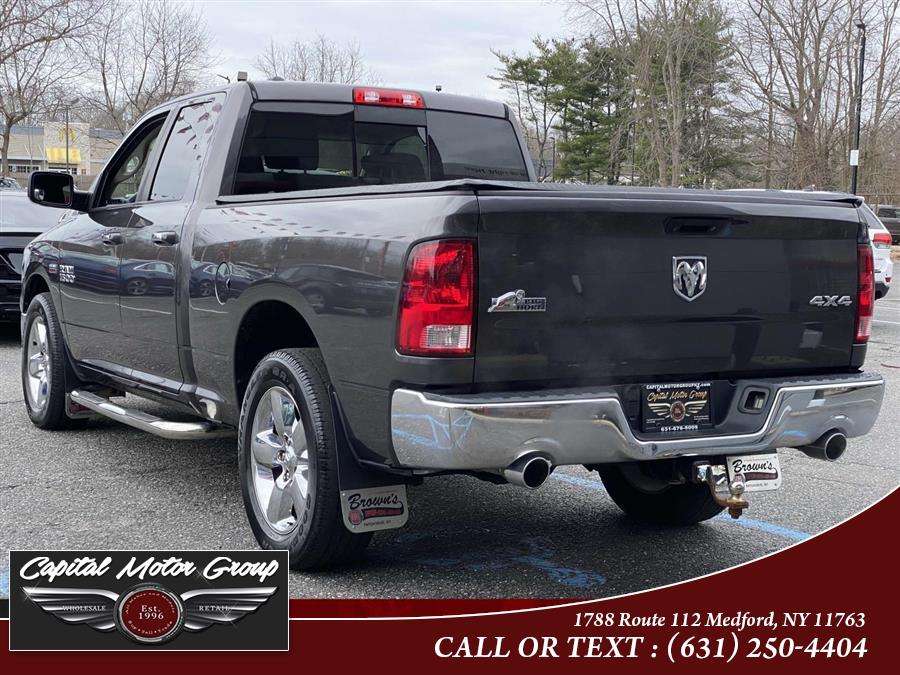 2014 Ram 1500 4WD Quad Cab 140.5" SLT, available for sale in Medford, New York | Capital Motor Group Inc. Medford, New York 2014 Ram 1500 4WD Quad Cab 140.5" SLT, available for sale in Medford, New York | Capital Motor Group Inc. Medford, New York
