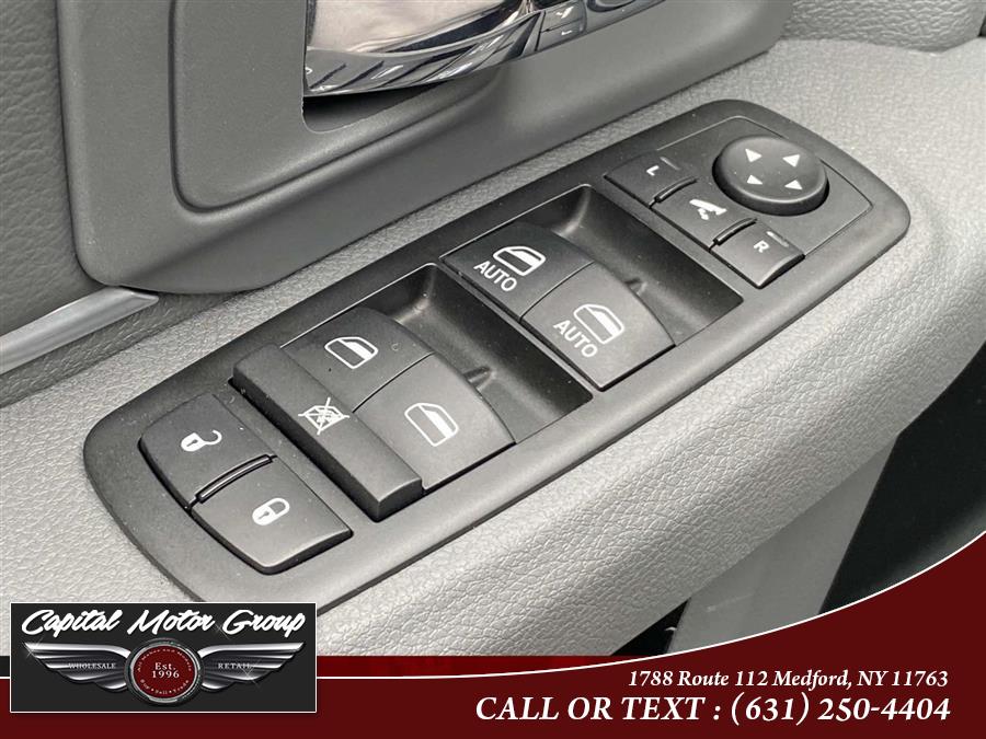 2014 Ram 1500 4WD Quad Cab 140.5" SLT, available for sale in Medford, New York | Capital Motor Group Inc. Medford, New York 2014 Ram 1500 4WD Quad Cab 140.5" SLT, available for sale in Medford, New York | Capital Motor Group Inc. Medford, New York