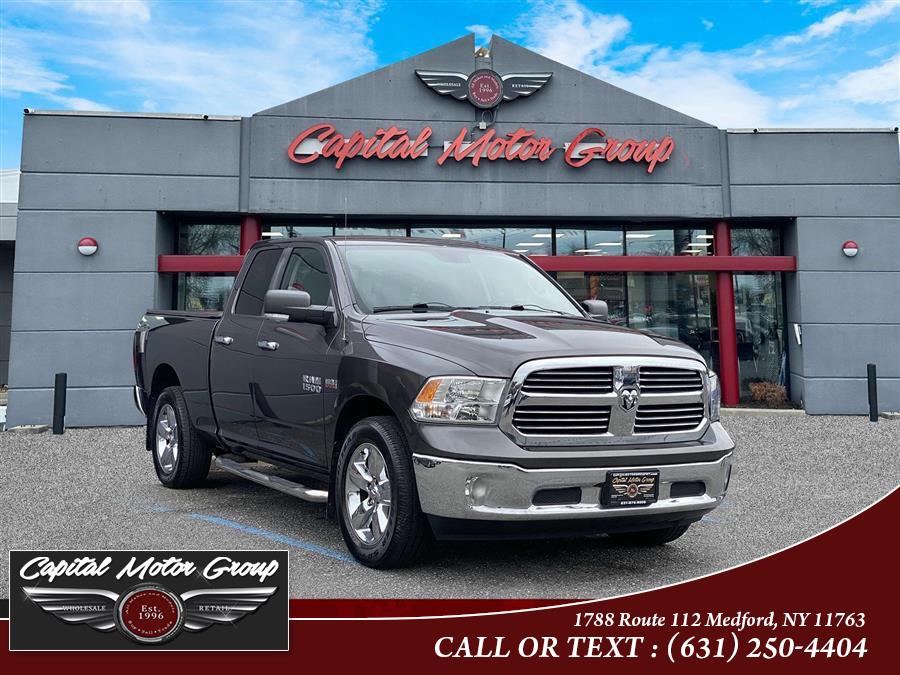 2014 Ram 1500 4WD Quad Cab 140.5" SLT, available for sale in Medford, New York | Capital Motor Group Inc. Medford, New York 2014 Ram 1500 4WD Quad Cab 140.5" SLT, available for sale in Medford, New York | Capital Motor Group Inc. Medford, New York