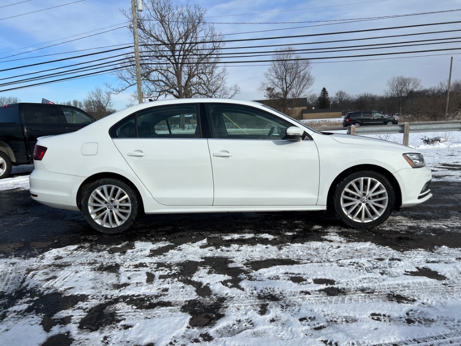 2016 Volkswagen Jetta Sedan 4dr Auto 1.8T SEL PZEV, available for sale in Ortonville, Michigan | Marsh Auto Sales LLC. Ortonville, Michigan 2016 Volkswagen Jetta Sedan 4dr Auto 1.8T SEL PZEV, available for sale in Ortonville, Michigan | Marsh Auto Sales LLC. Ortonville, Michigan