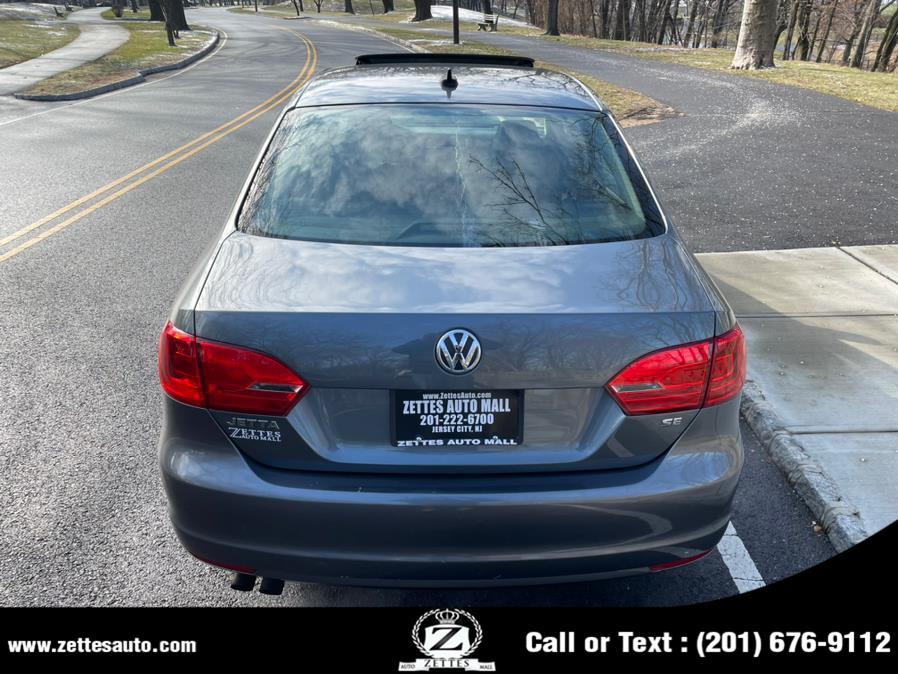 2014 Volkswagen Jetta Sedan 4dr Auto SE PZEV, available for sale in Jersey City, New Jersey | Zettes Auto Mall. Jersey City, New Jersey 2014 Volkswagen Jetta Sedan 4dr Auto SE PZEV, available for sale in Jersey City, New Jersey | Zettes Auto Mall. Jersey City, New Jersey