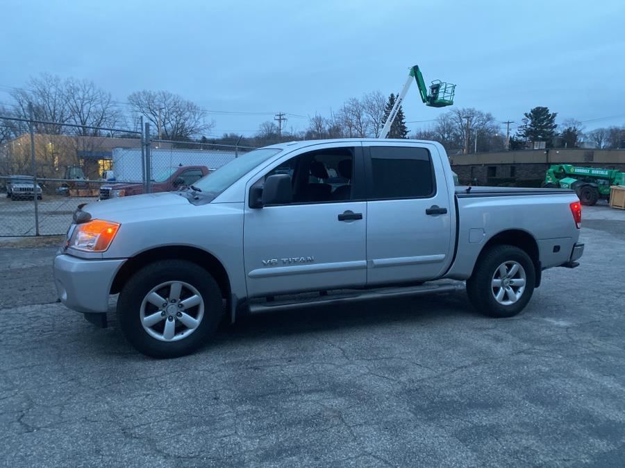 2014 Nissan Titan 4WD Crew Cab SWB SV, available for sale in Milford, Connecticut | Dealertown Auto Wholesalers. Milford, Connecticut 2014 Nissan Titan 4WD Crew Cab SWB SV, available for sale in Milford, Connecticut | Dealertown Auto Wholesalers. Milford, Connecticut