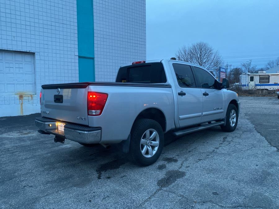 2014 Nissan Titan 4WD Crew Cab SWB SV, available for sale in Milford, Connecticut | Dealertown Auto Wholesalers. Milford, Connecticut 2014 Nissan Titan 4WD Crew Cab SWB SV, available for sale in Milford, Connecticut | Dealertown Auto Wholesalers. Milford, Connecticut