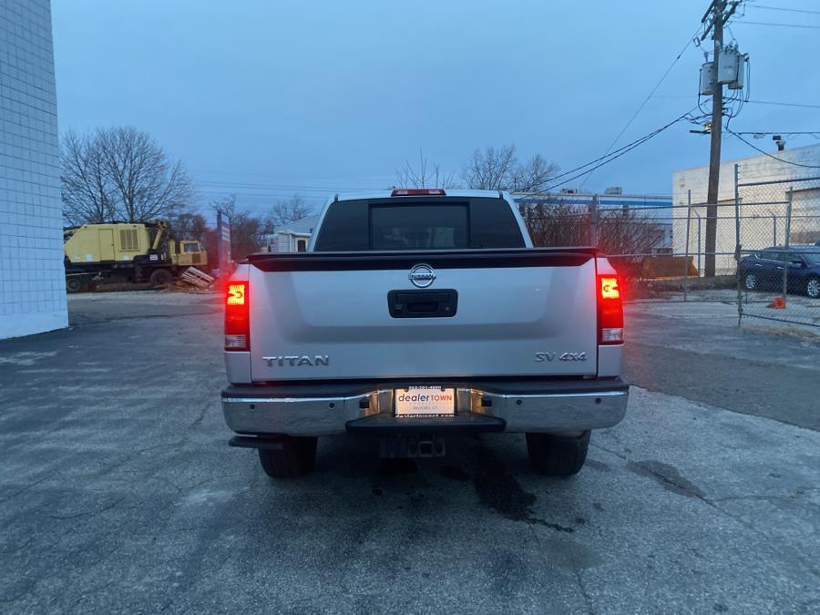 2014 Nissan Titan 4WD Crew Cab SWB SV, available for sale in Milford, Connecticut | Dealertown Auto Wholesalers. Milford, Connecticut 2014 Nissan Titan 4WD Crew Cab SWB SV, available for sale in Milford, Connecticut | Dealertown Auto Wholesalers. Milford, Connecticut