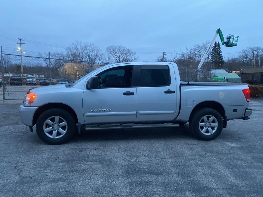 2014 Nissan Titan 4WD Crew Cab SWB SV, available for sale in Milford, Connecticut | Dealertown Auto Wholesalers. Milford, Connecticut 2014 Nissan Titan 4WD Crew Cab SWB SV, available for sale in Milford, Connecticut | Dealertown Auto Wholesalers. Milford, Connecticut