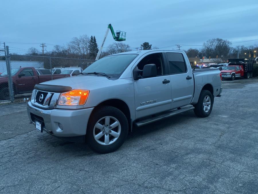 2014 Nissan Titan 4WD Crew Cab SWB SV, available for sale in Milford, Connecticut | Dealertown Auto Wholesalers. Milford, Connecticut 2014 Nissan Titan 4WD Crew Cab SWB SV, available for sale in Milford, Connecticut | Dealertown Auto Wholesalers. Milford, Connecticut