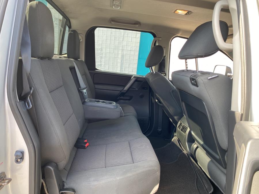 2014 Nissan Titan 4WD Crew Cab SWB SV, available for sale in Milford, Connecticut | Dealertown Auto Wholesalers. Milford, Connecticut 2014 Nissan Titan 4WD Crew Cab SWB SV, available for sale in Milford, Connecticut | Dealertown Auto Wholesalers. Milford, Connecticut