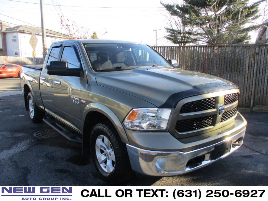 2013 Ram 1500 4WD Quad Cab 140.5" SLT, available for sale in West Babylon, New York | New Gen Auto Group. West Babylon, New York