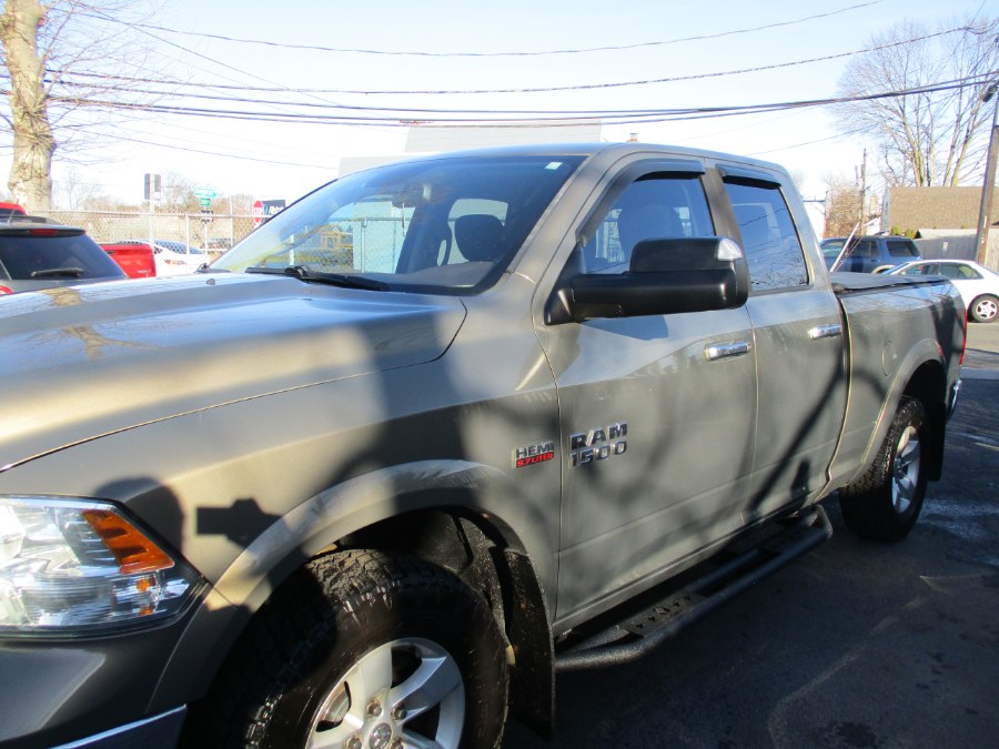 2013 Ram 1500 4WD Quad Cab 140.5" SLT, available for sale in West Babylon, New York | New Gen Auto Group. West Babylon, New York 2013 Ram 1500 4WD Quad Cab 140.5" SLT, available for sale in West Babylon, New York | New Gen Auto Group. West Babylon, New York