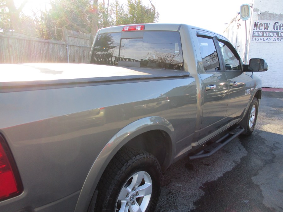 2013 Ram 1500 4WD Quad Cab 140.5" SLT, available for sale in West Babylon, New York | New Gen Auto Group. West Babylon, New York 2013 Ram 1500 4WD Quad Cab 140.5" SLT, available for sale in West Babylon, New York | New Gen Auto Group. West Babylon, New York