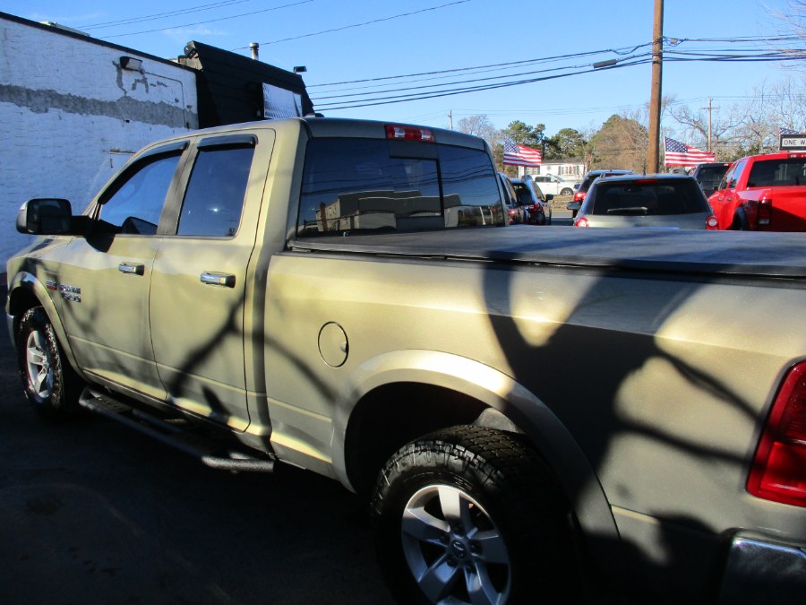 2013 Ram 1500 4WD Quad Cab 140.5" SLT, available for sale in West Babylon, New York | New Gen Auto Group. West Babylon, New York 2013 Ram 1500 4WD Quad Cab 140.5" SLT, available for sale in West Babylon, New York | New Gen Auto Group. West Babylon, New York