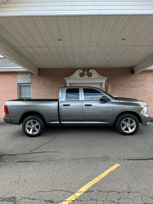 2012 Ram 1500 4WD Quad Cab 140.5" ST, available for sale in New Britain, Connecticut | Supreme Automotive. New Britain, Connecticut 2012 Ram 1500 4WD Quad Cab 140.5" ST, available for sale in New Britain, Connecticut | Supreme Automotive. New Britain, Connecticut