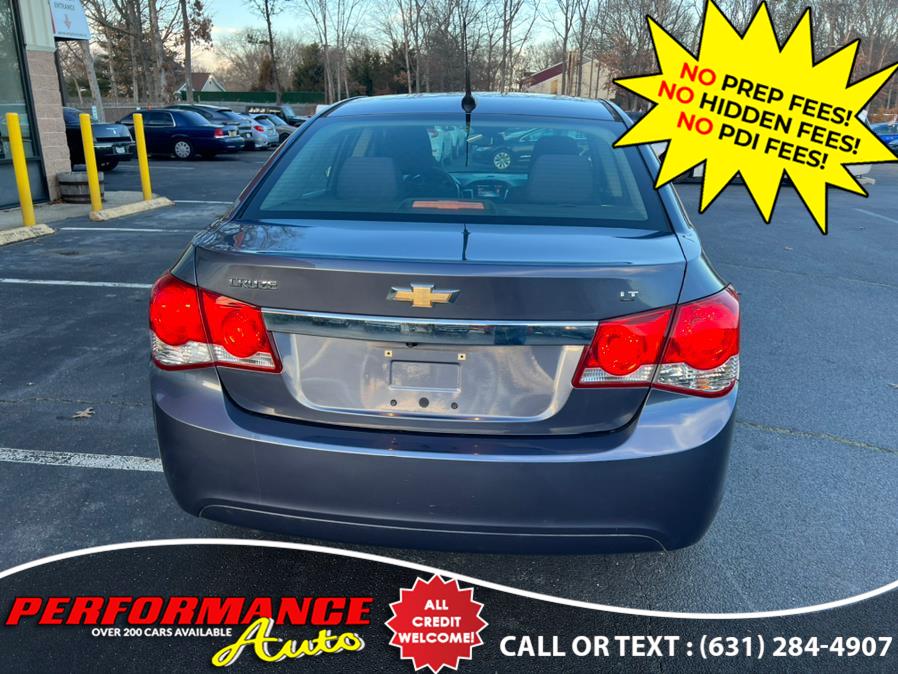 2014 Chevrolet Cruze 4dr Sdn Auto 1LT, available for sale in Bohemia, New York | Performance Auto Inc. Bohemia, New York 2014 Chevrolet Cruze 4dr Sdn Auto 1LT, available for sale in Bohemia, New York | Performance Auto Inc. Bohemia, New York