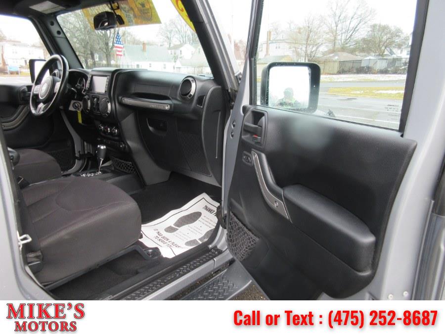 2015 Jeep Wrangler Unlimited 4WD 4dr Sport, available for sale in Stratford, Connecticut | Mike's Motors LLC. Stratford, Connecticut 2015 Jeep Wrangler Unlimited 4WD 4dr Sport, available for sale in Stratford, Connecticut | Mike's Motors LLC. Stratford, Connecticut