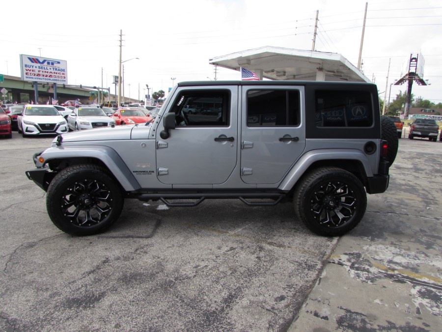 2013 Jeep Wrangler Unlimited 4WD 4dr Sahara, available for sale in Orlando, Florida | VIP Auto Enterprise, Inc. Orlando, Florida 2013 Jeep Wrangler Unlimited 4WD 4dr Sahara, available for sale in Orlando, Florida | VIP Auto Enterprise, Inc. Orlando, Florida