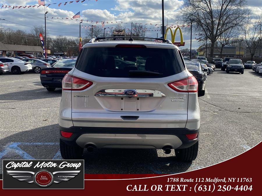 2014 Ford Escape FWD 4dr Titanium, available for sale in Medford, New York | Capital Motor Group Inc. Medford, New York 2014 Ford Escape FWD 4dr Titanium, available for sale in Medford, New York | Capital Motor Group Inc. Medford, New York