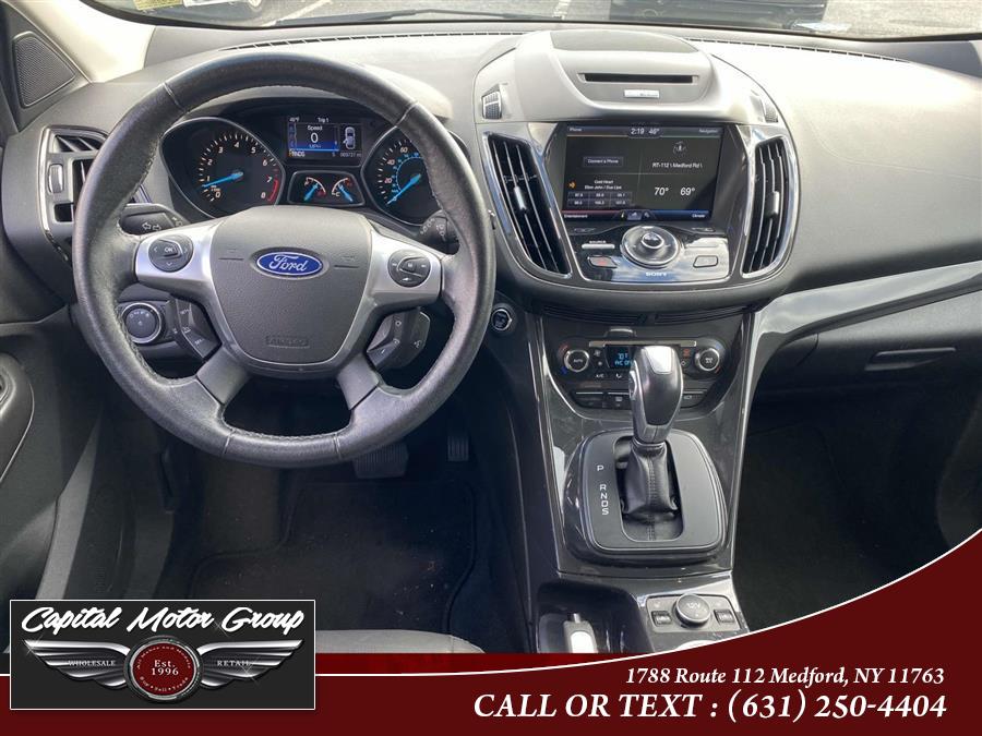 2014 Ford Escape FWD 4dr Titanium, available for sale in Medford, New York | Capital Motor Group Inc. Medford, New York 2014 Ford Escape FWD 4dr Titanium, available for sale in Medford, New York | Capital Motor Group Inc. Medford, New York
