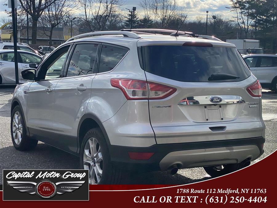 2014 Ford Escape FWD 4dr Titanium, available for sale in Medford, New York | Capital Motor Group Inc. Medford, New York 2014 Ford Escape FWD 4dr Titanium, available for sale in Medford, New York | Capital Motor Group Inc. Medford, New York