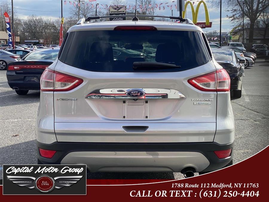 2014 Ford Escape FWD 4dr Titanium, available for sale in Medford, New York | Capital Motor Group Inc. Medford, New York 2014 Ford Escape FWD 4dr Titanium, available for sale in Medford, New York | Capital Motor Group Inc. Medford, New York