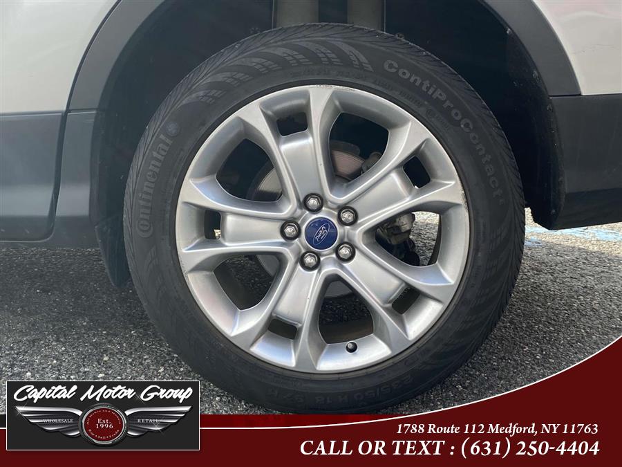 2014 Ford Escape FWD 4dr Titanium, available for sale in Medford, New York | Capital Motor Group Inc. Medford, New York 2014 Ford Escape FWD 4dr Titanium, available for sale in Medford, New York | Capital Motor Group Inc. Medford, New York